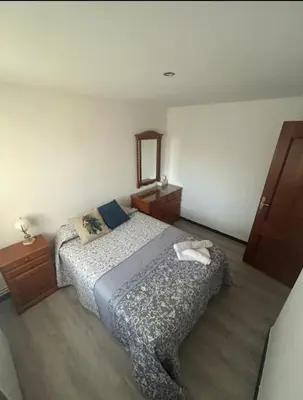 Cama o camas de una habitación en El jardín de las piedras