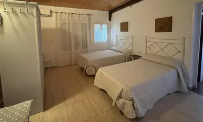 Cama o camas de una habitación en Casa Rural Cornalvo