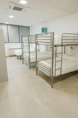 Cama o camas de una habitación en Albergue Pundak Valle del Jerte