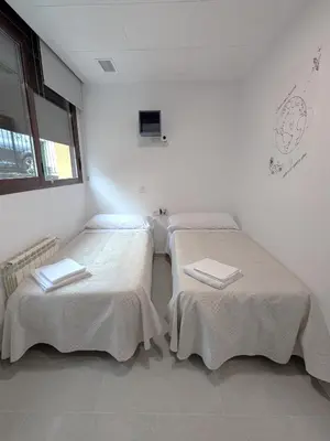Cama o camas de una habitación en Albergue Pundak Valle del Jerte