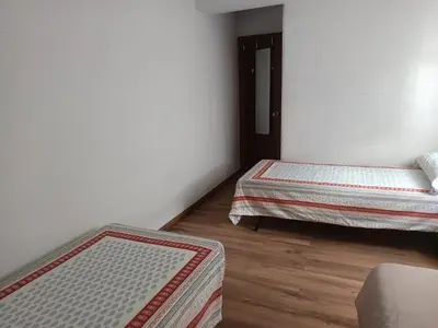 Cama o camas de una habitación en Acogedora habitación privada en piso familiar con baño compartido