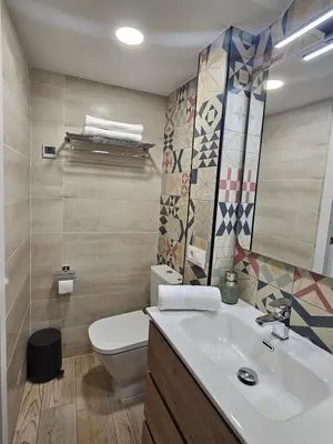 Un baño de Mural del Castillo II, La Alberca