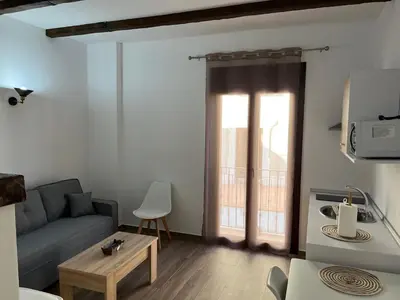 Zona de estar de Apartamentos Los Belloso