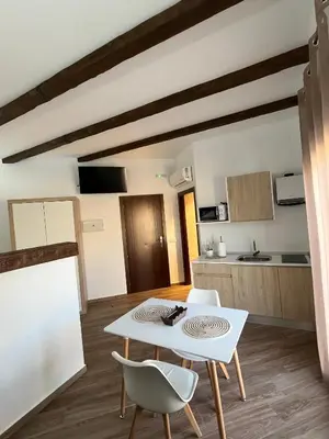 Una cocina o zona de cocina en Apartamentos Los Belloso