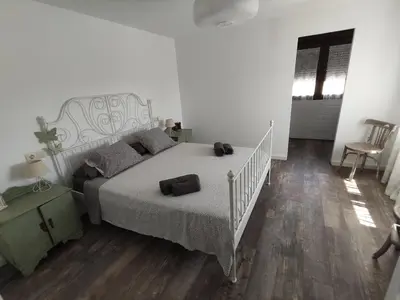 Cama o camas de una habitación en El MIRADOR DEL TORMES