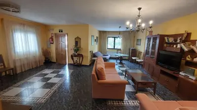 Una televisión o centro de entretenimiento en Casa Rural Ambroz