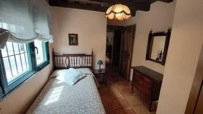 Cama o camas de una habitación en Casa Rural Ambroz