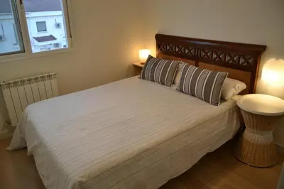 Cama o camas de una habitación en Apartamento Tíbula Teatro Parking