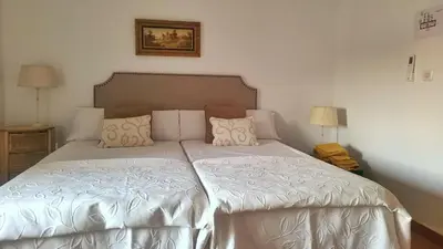 Cama o camas de una habitación en Cortijo Negretti
