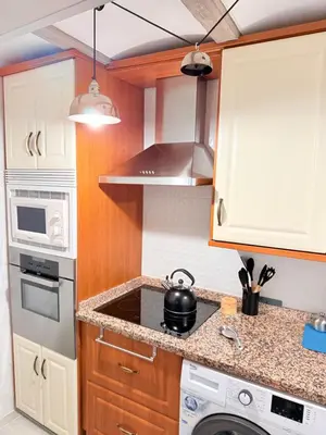 Una cocina o zona de cocina en El Boulevard de Trujillo 1997