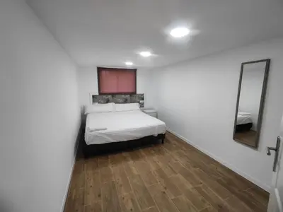 Cama o camas de una habitación en Winahost El Retiro de Toledo