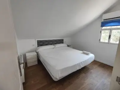 Cama o camas de una habitación en Winahost El Retiro de Toledo