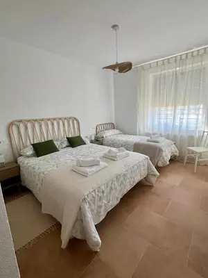 Cama o camas de una habitación en Casa Rural Las Escuelas de Pradoalegre