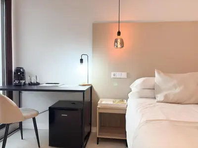 Cama o camas de una habitación en TAYP Navalmoral Estudios