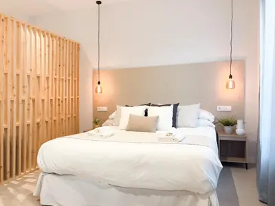 Cama o camas de una habitación en TAYP Navalmoral Estudios