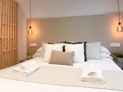 Cama o camas de una habitación en TAYP Navalmoral Estudios