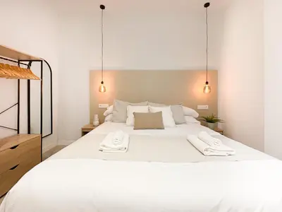 Cama o camas de una habitación en TAYP Navalmoral Apartamentos
