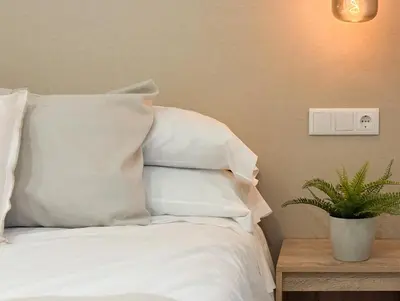Cama o camas de una habitación en TAYP Navalmoral Apartamentos