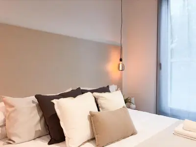 Cama o camas de una habitación en TAYP Navalmoral Apartamentos