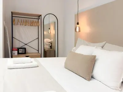 Cama o camas de una habitación en TAYP Navalmoral Apartamentos