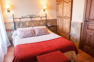 Cama o camas de una habitación en Casas Rurales La Dehesa