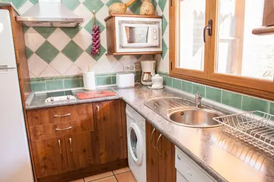 Una cocina o zona de cocina en Casas Rurales La Dehesa