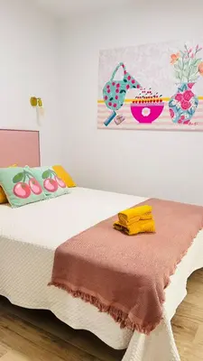 Cama o camas de una habitación en Apartamentos la Cárcava