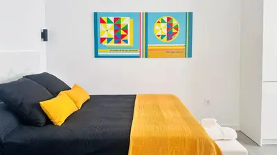 Cama o camas de una habitación en Apartamentos la Cárcava