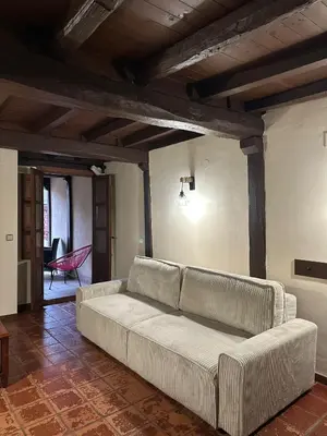 Zona de estar de Apartamentos Rurales La Plaza