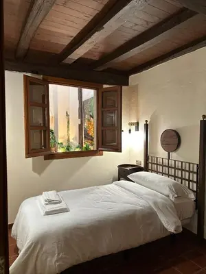 Cama o camas de una habitación en Apartamentos Rurales La Plaza