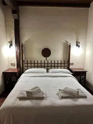 Cama o camas de una habitación en Apartamentos Rurales La Plaza