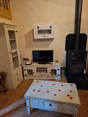 Una televisión o centro de entretenimiento en La casa de la unión