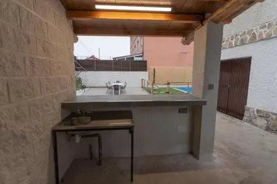 Una cocina o zona de cocina en El Salón de Arriba