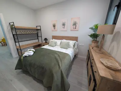Cama o camas de una habitación en Apartamento Turistico NC