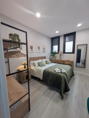 Cama o camas de una habitación en Apartamento Turistico NC