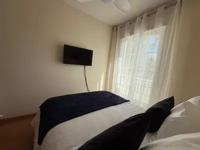Cama o camas de una habitación en Acogedor chalet con jardín ideal para desconectar