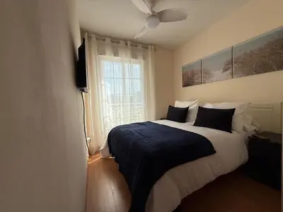 Cama o camas de una habitación en Acogedor chalet con jardín ideal para desconectar