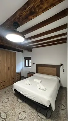 Cama o camas de una habitación en La Casa de los Testarros