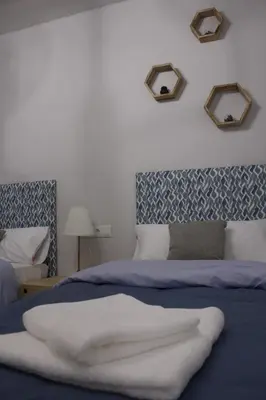 Cama o camas de una habitación en La Palomilla