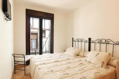 Cama o camas de una habitación en Hostal Yessy