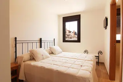 Cama o camas de una habitación en Hostal Yessy