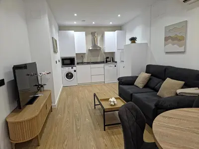 Una cocina o zona de cocina en Apartamentos Picasso by gaiarooms