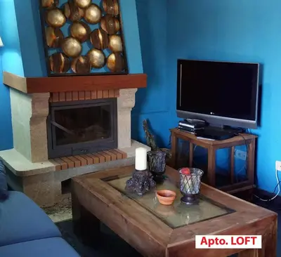Una televisión o centro de entretenimiento en Casa Tictagora