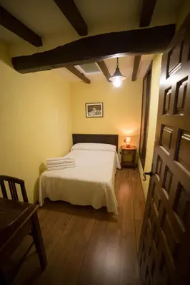 Cama o camas de una habitación en Casa Rural LA REGADERA I