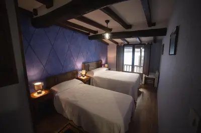 Cama o camas de una habitación en Casa Rural LA REGADERA II