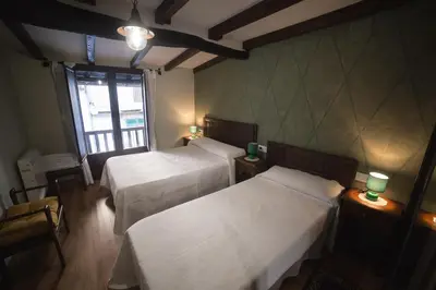 Cama o camas de una habitación en Casa Rural LA REGADERA II