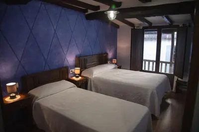Cama o camas de una habitación en Casa Rural LA REGADERA II