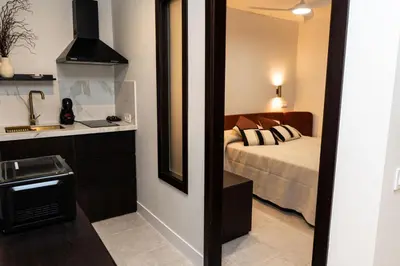 Cama o camas de una habitación en Apartamentos Máximo Parking gratis