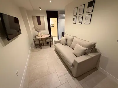 Zona de estar de Apartamentos Máximo Parking gratis