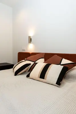 Cama o camas de una habitación en Apartamentos Máximo Parking gratis